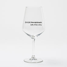Load image into Gallery viewer, "Over Thinking/Drinking" wine glass by Johanna Schwarzer × selekkt