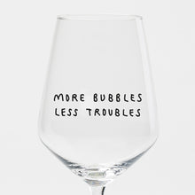Load image into Gallery viewer, "More Bubbles Less Troubles" wine glass by Johanna Schwarzer × selekkt