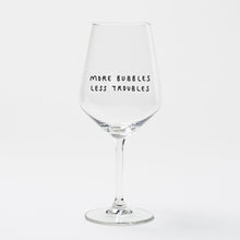 Load image into Gallery viewer, "More Bubbles Less Troubles" wine glass by Johanna Schwarzer × selekkt
